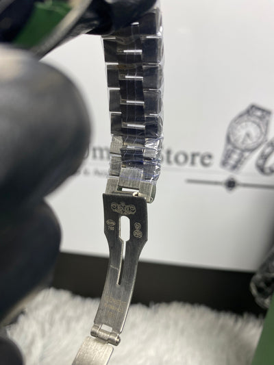 Rolex Silver Day And Date In White Dial